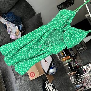 Blu Pepper grease floral dress. Front ties in two places as seen in photo.